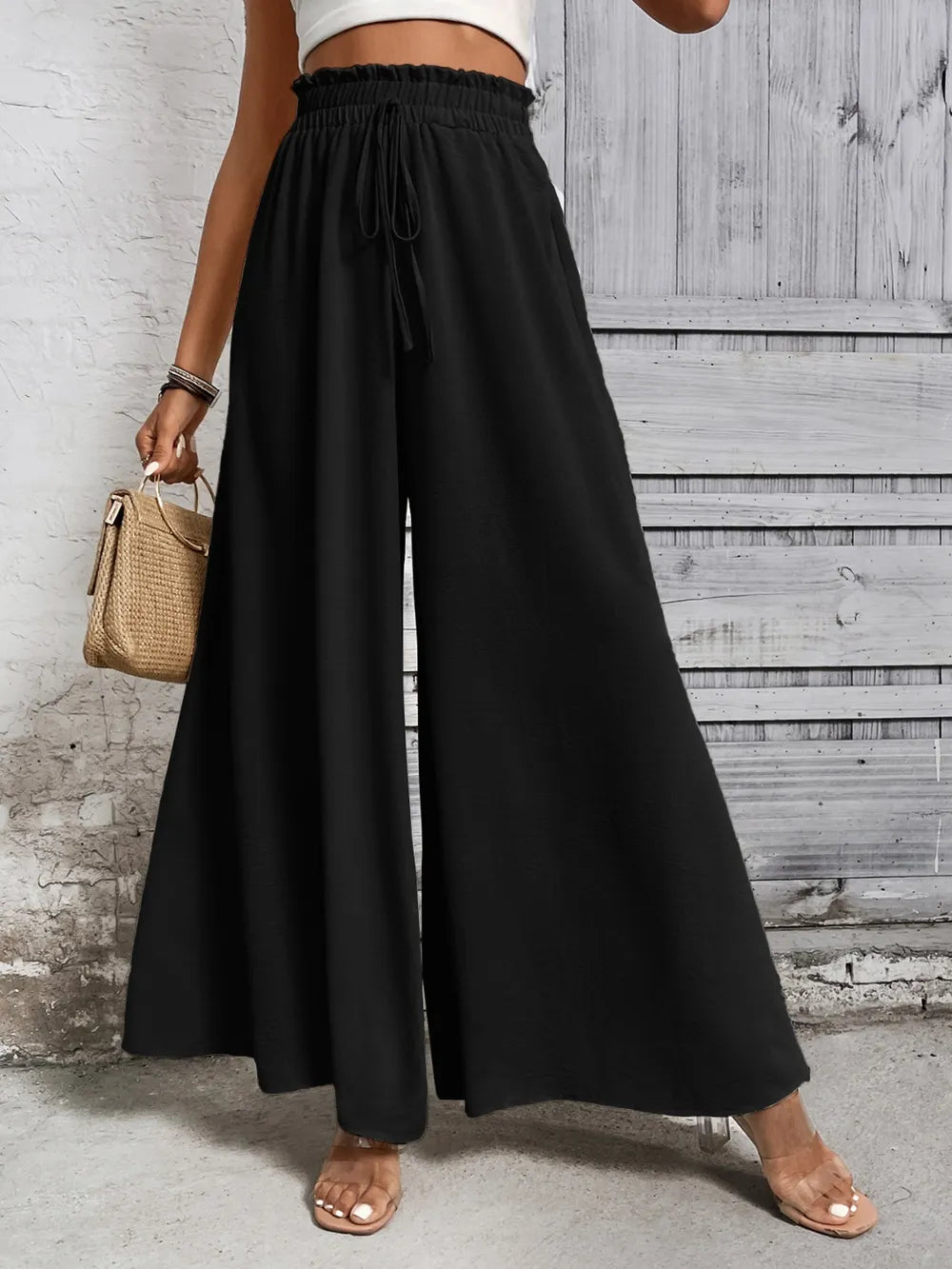 Pantalones anchos de cintura alta con lazo de miel
