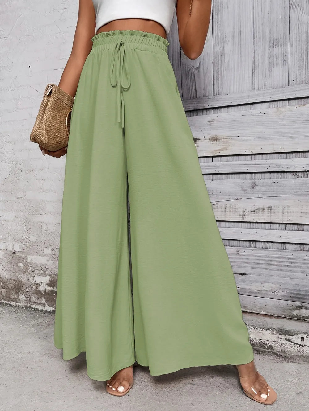 Pantalones anchos de cintura alta con lazo de miel