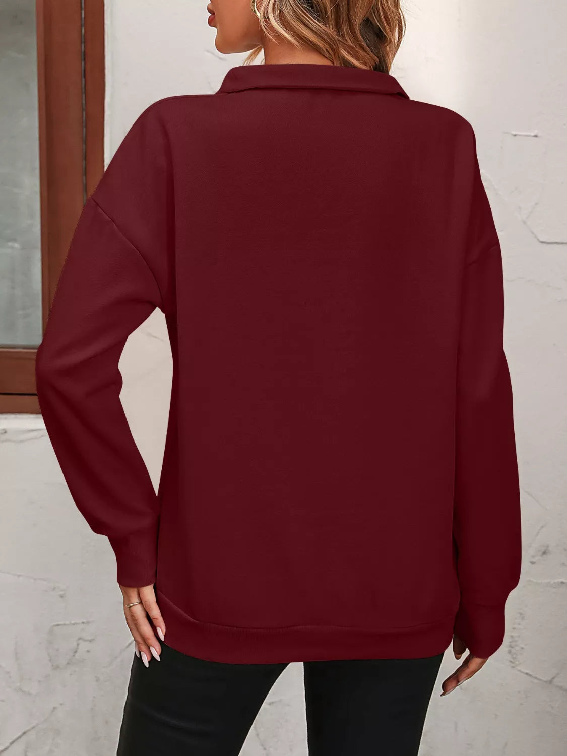 Sudadera con cremallera corta y hombros caídos