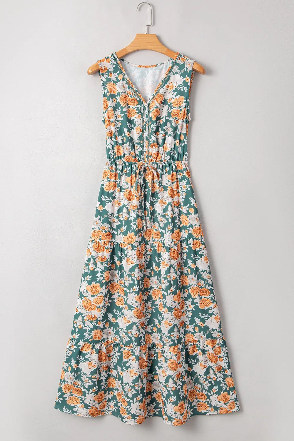 Vestido sin mangas con cuello en V y cintura anudada con estampado floral