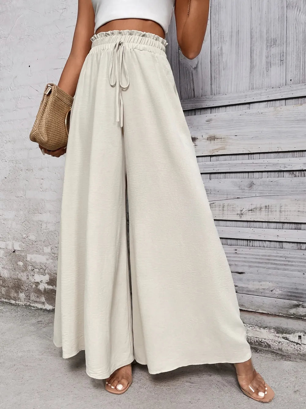 Pantalones anchos de cintura alta con lazo de miel