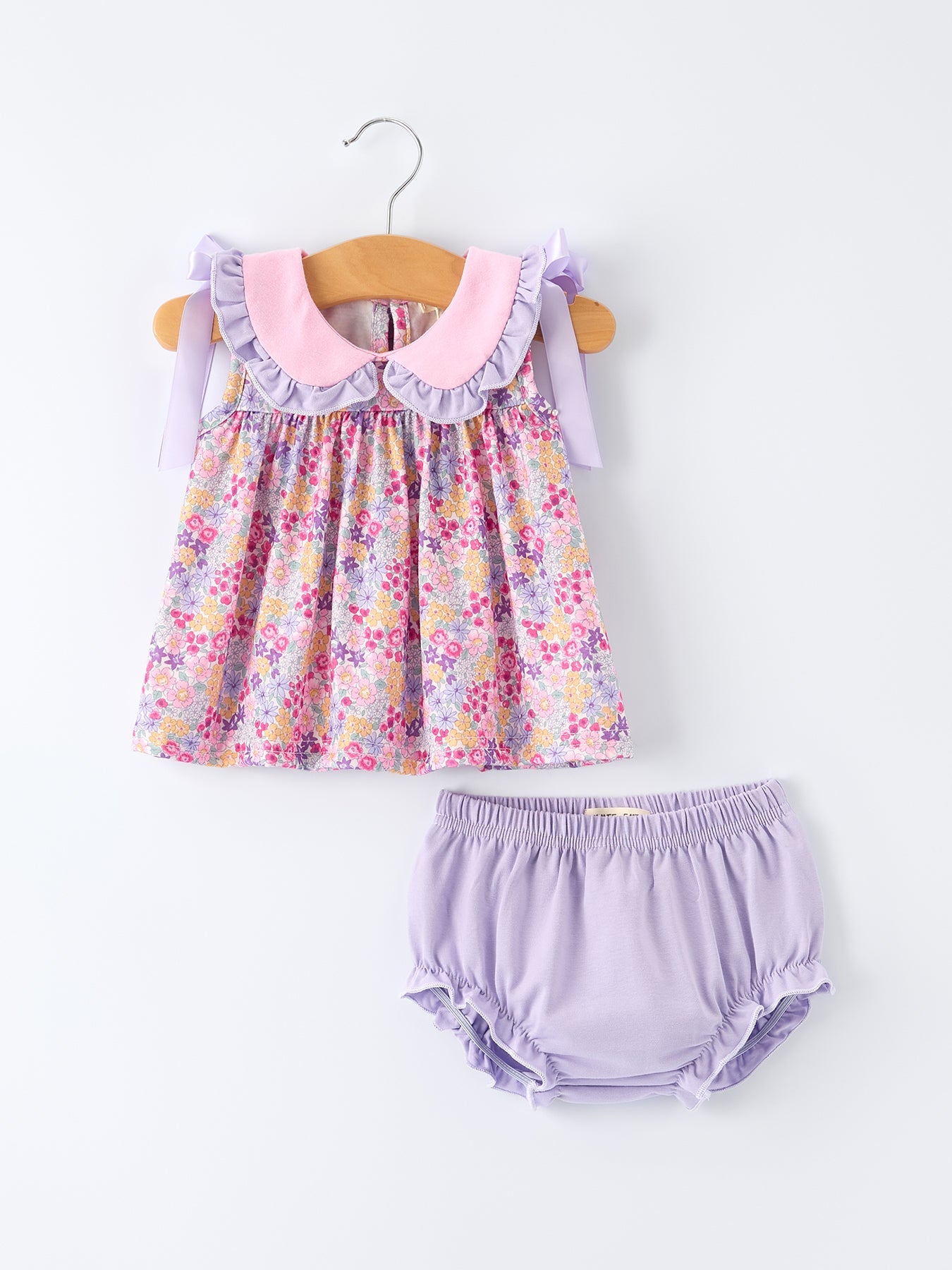 Conjunto de pantalones bombachos con volantes y lazo floral morado de primavera para niña