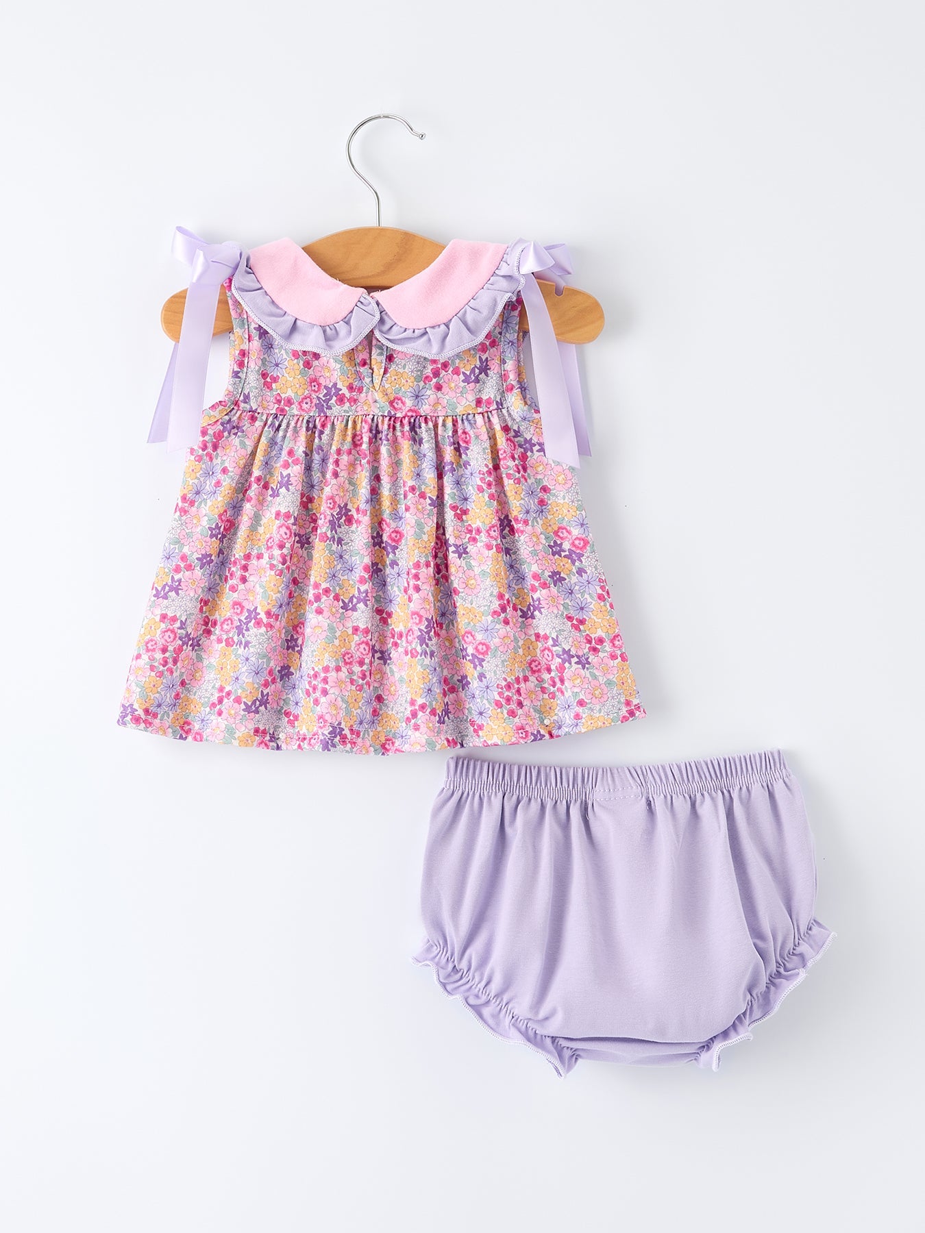 Conjunto de pantalones bombachos con volantes y lazo floral morado de primavera para niña