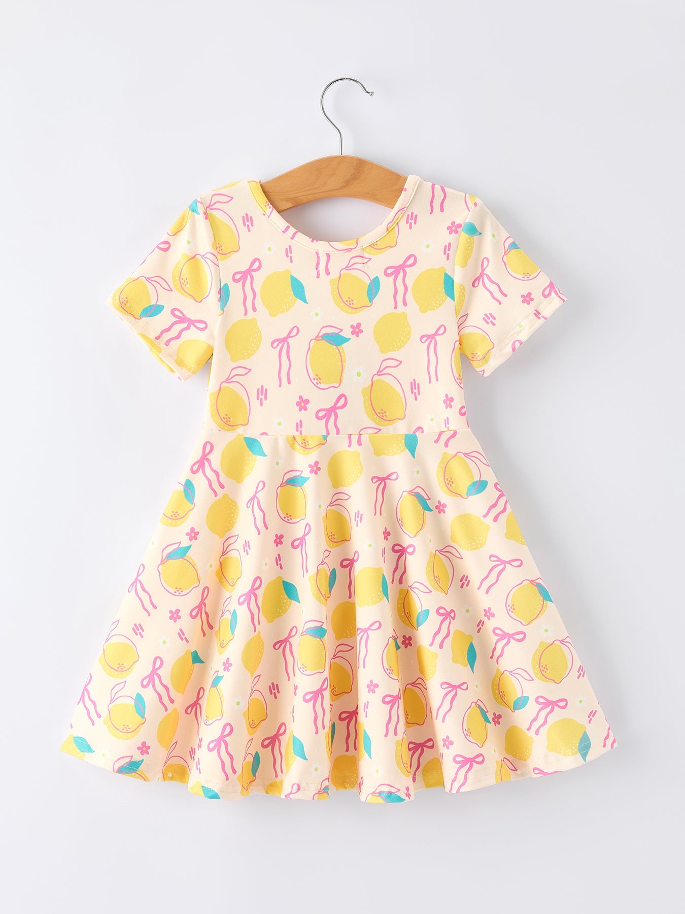 Vestido de verano con estampado de lazo y limones para niña