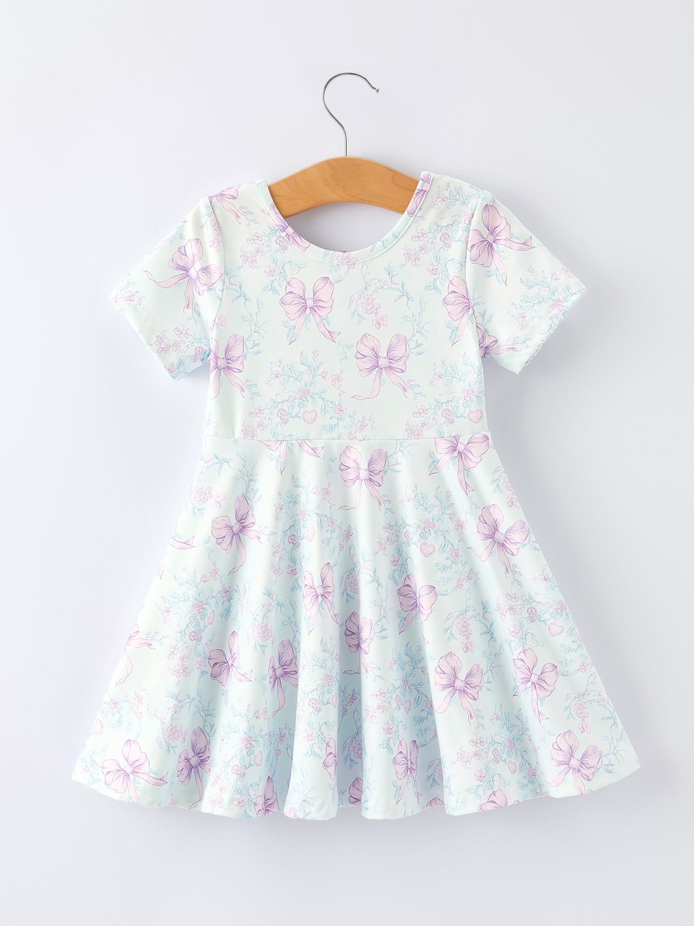 Vestido de niña con estampado floral y lazo de verano
