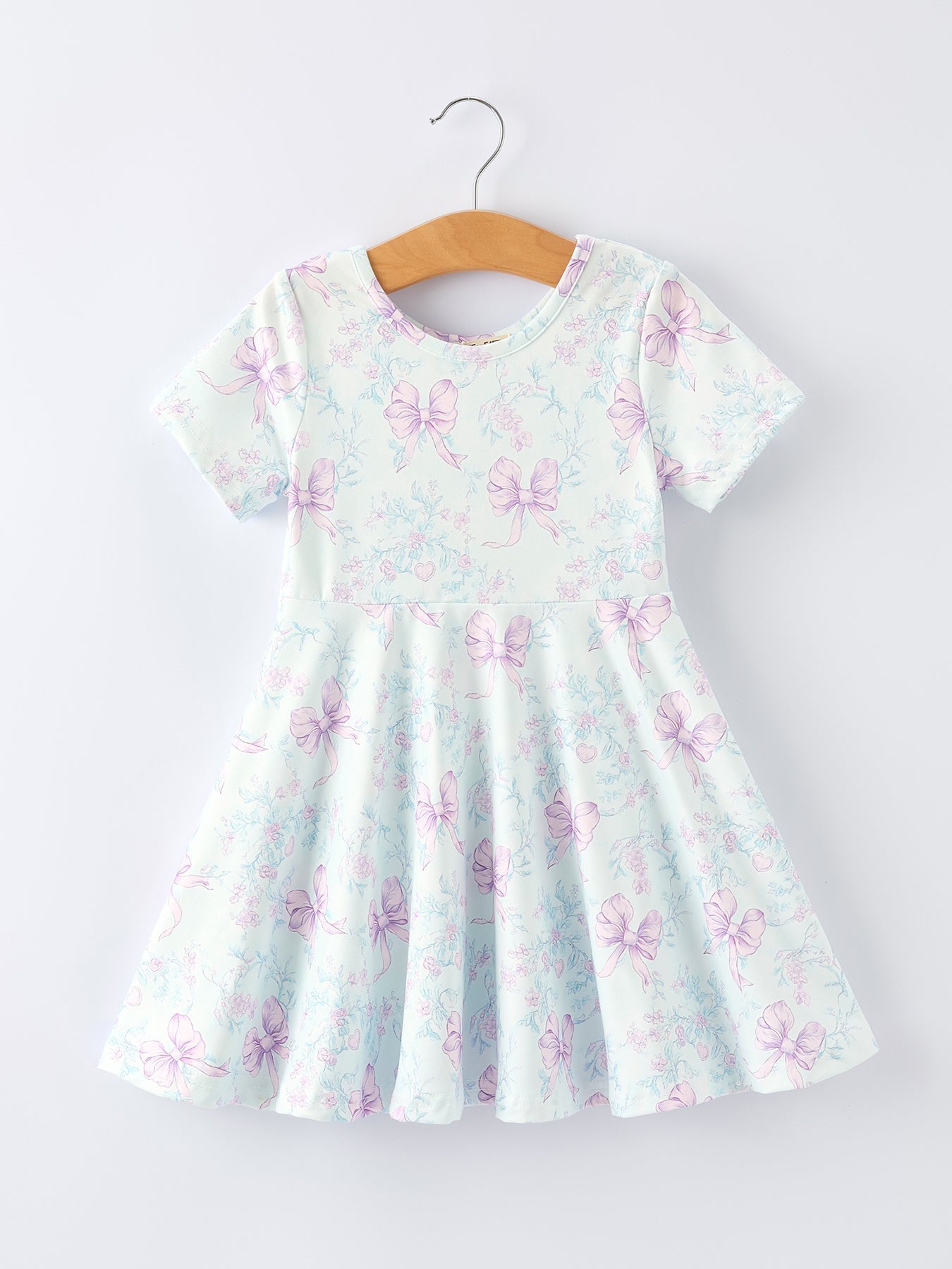 Vestido de niña con estampado floral y lazo de verano