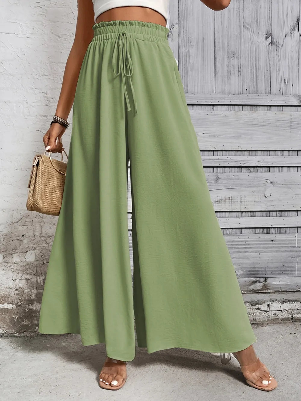 Pantalones anchos de cintura alta con lazo de miel