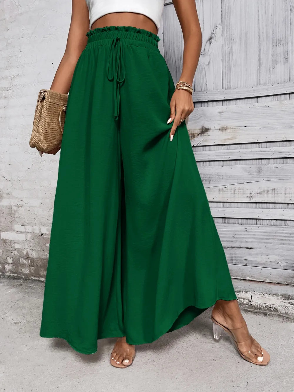 Pantalones anchos de cintura alta con lazo de miel