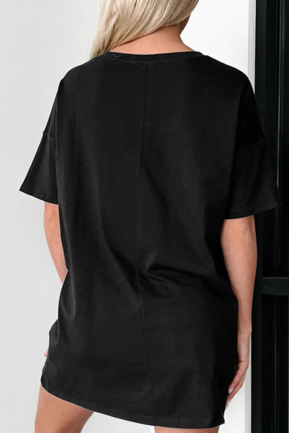 Camiseta holgada de manga corta con cuello redondo y estampado gráfico