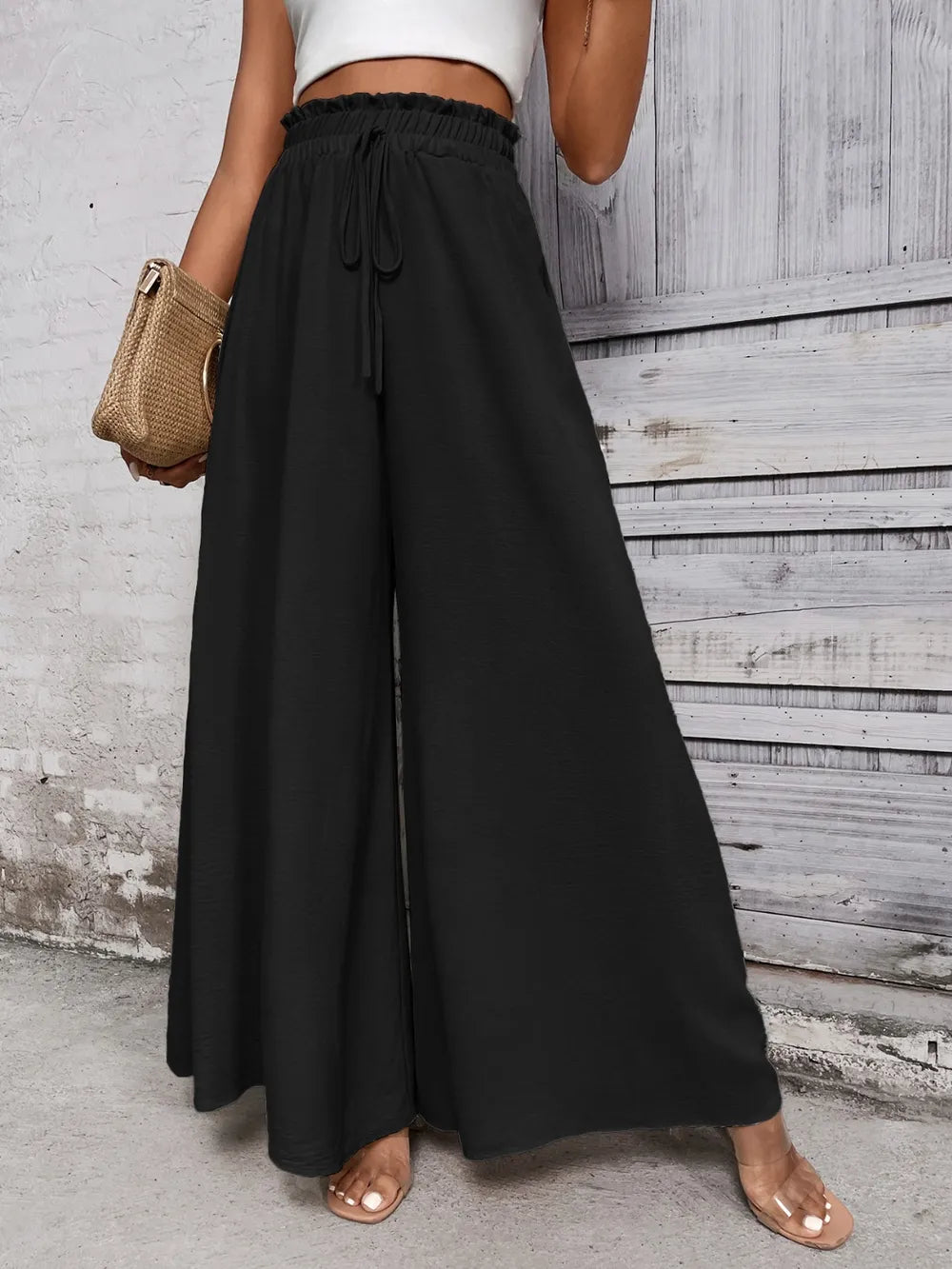 Pantalones anchos de cintura alta con lazo de miel