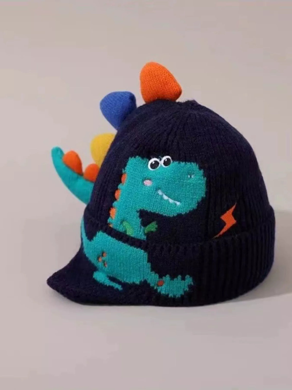 Gorro de dinosaurio de punto para niños