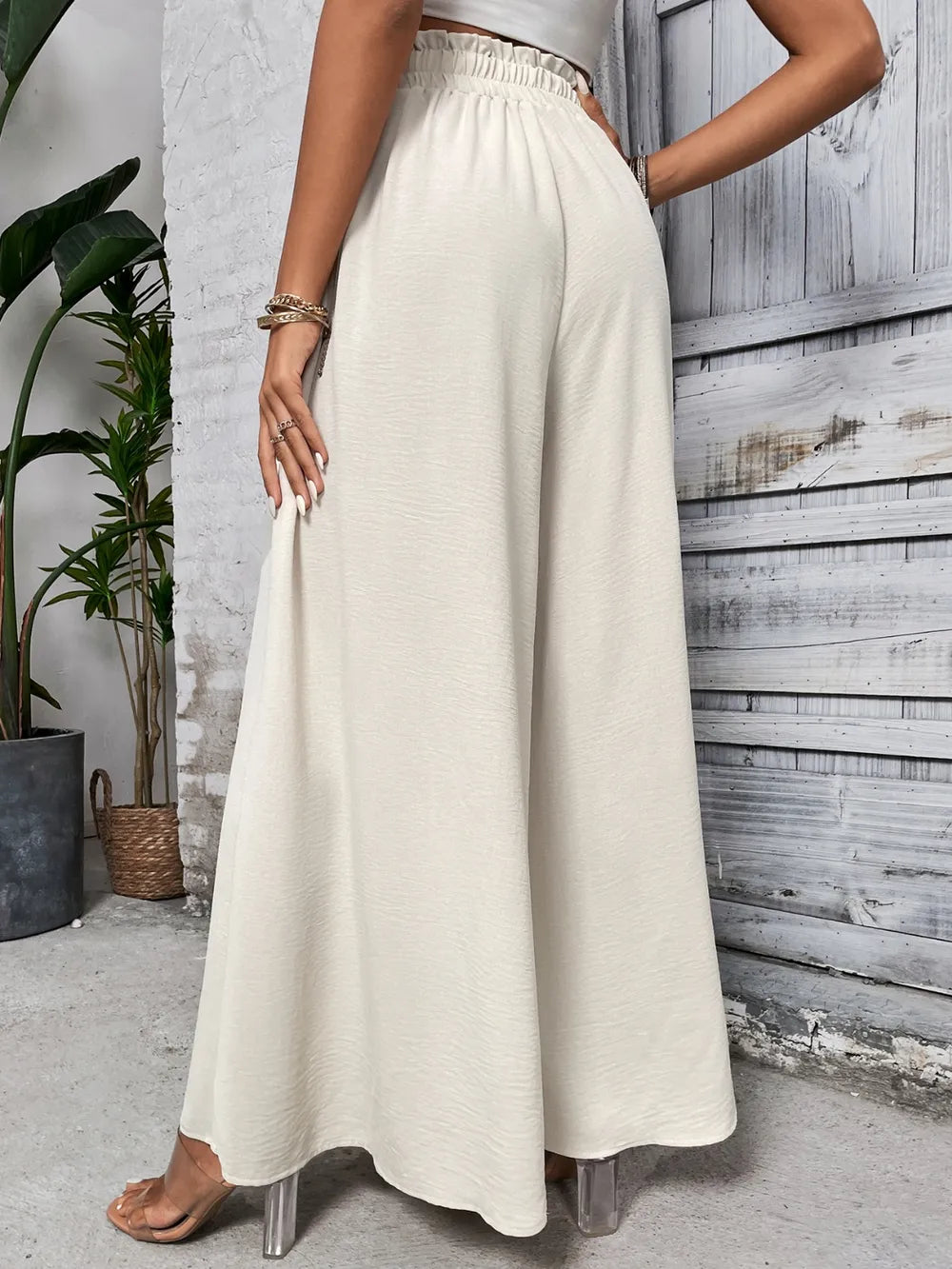 Pantalones anchos de cintura alta con lazo de miel