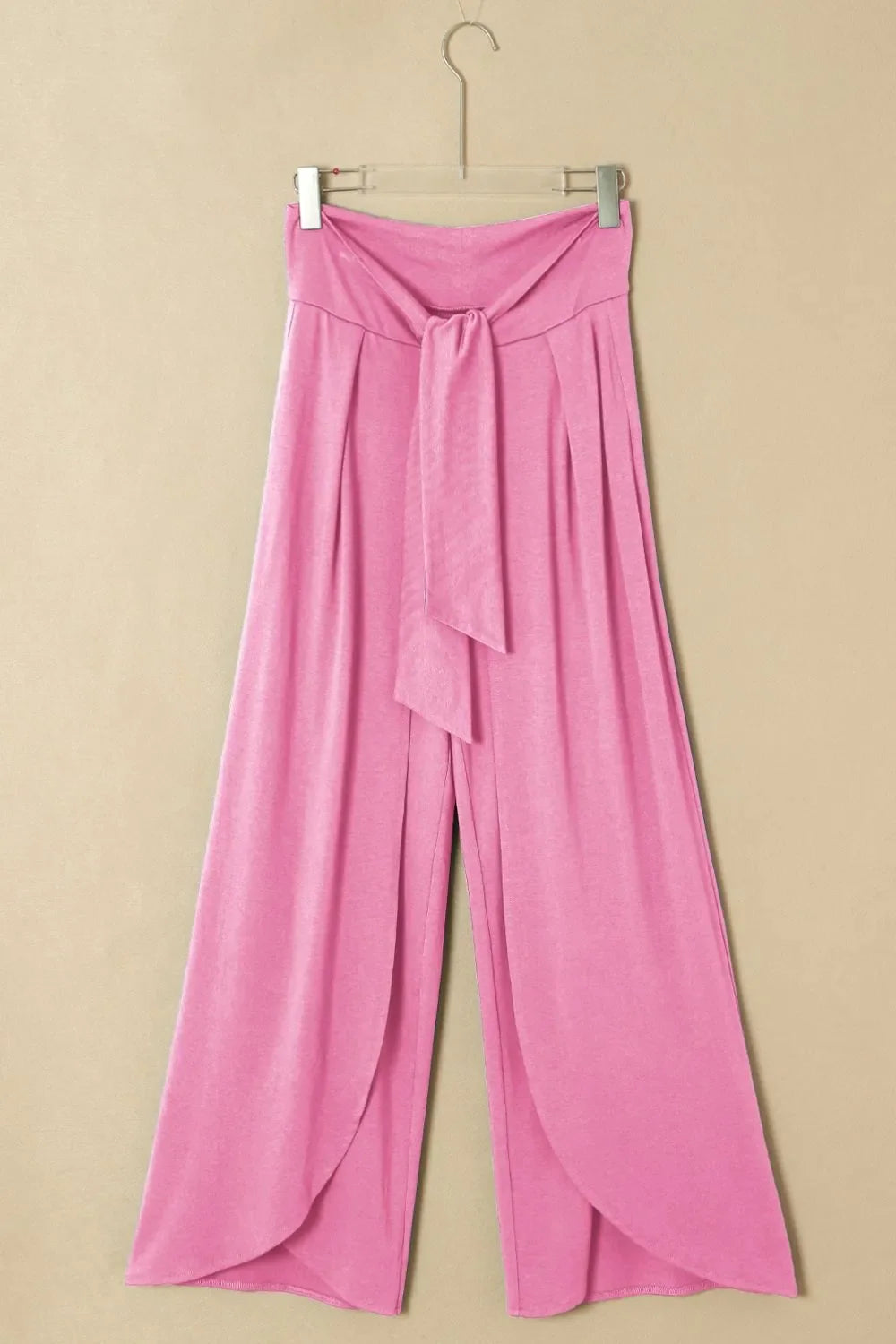Pantalones holgados con cintura anudada y pierna dividida
