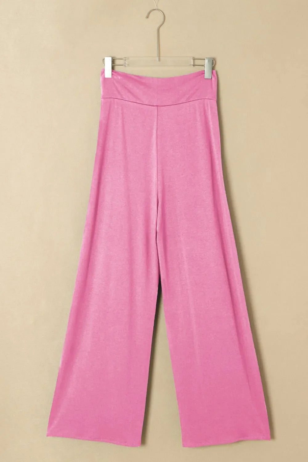Pantalones holgados con cintura anudada y pierna dividida
