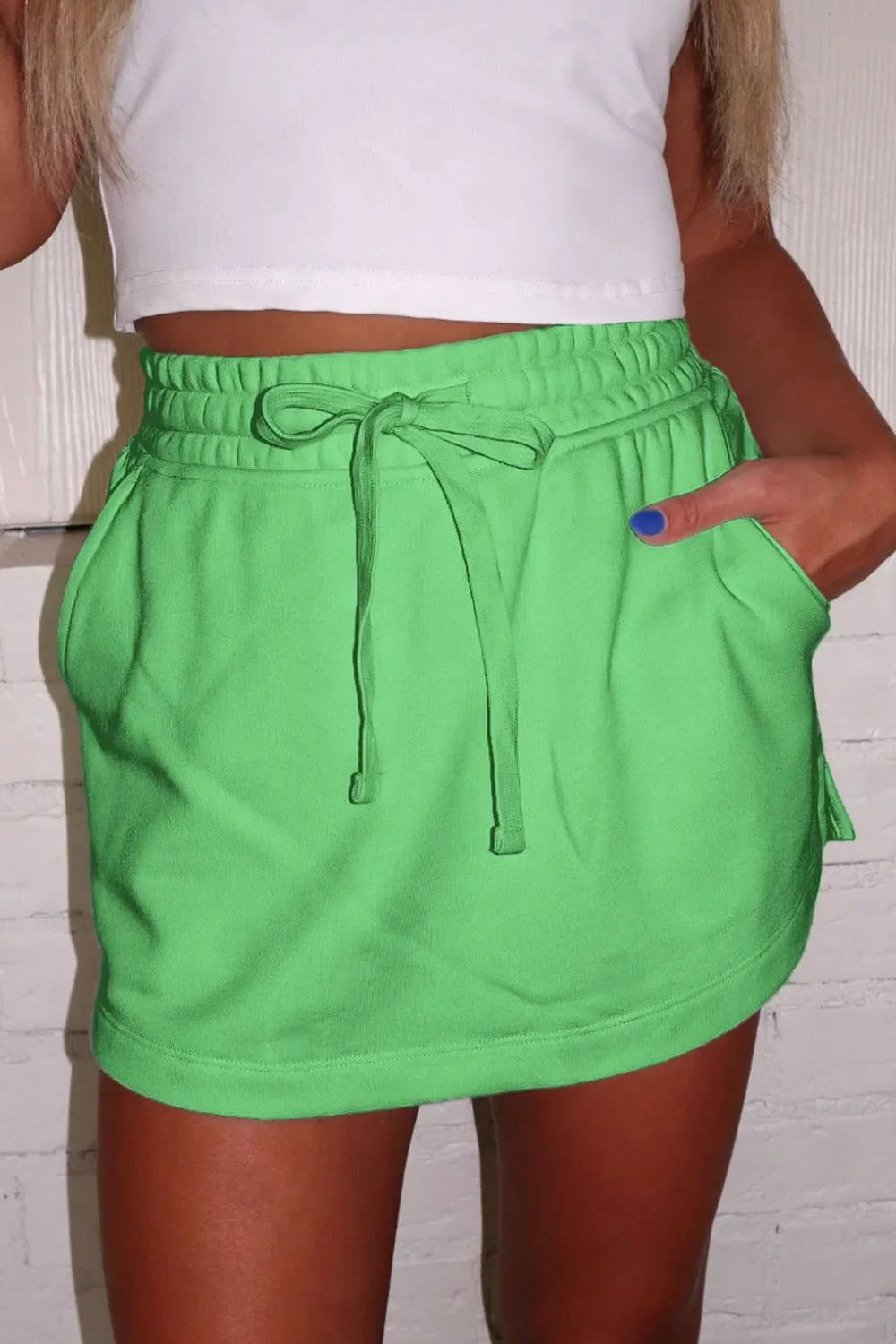 Minifalda pantalón lisa con cordón