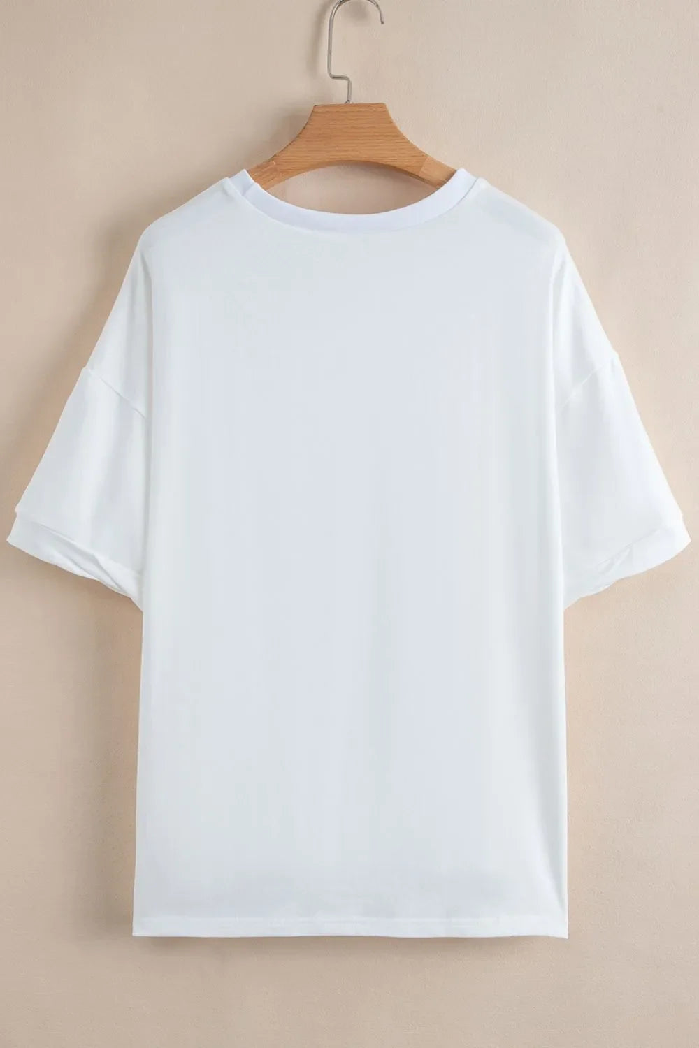 Camiseta holgada de media manga con dobladillo alto y bajo