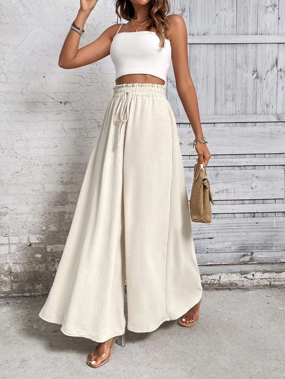 Pantalones anchos de cintura alta con lazo de miel