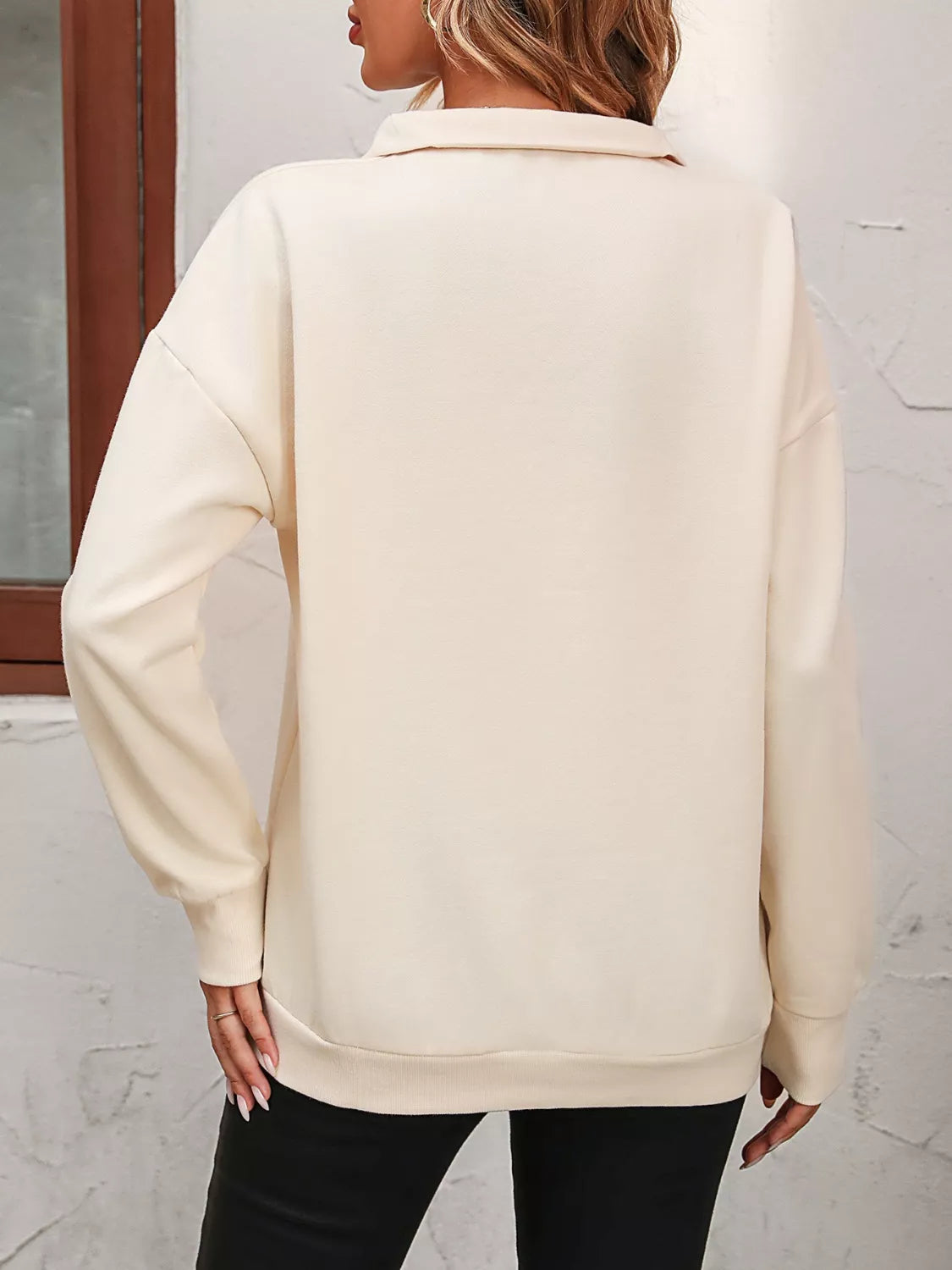 Sudadera con cremallera corta y hombros caídos