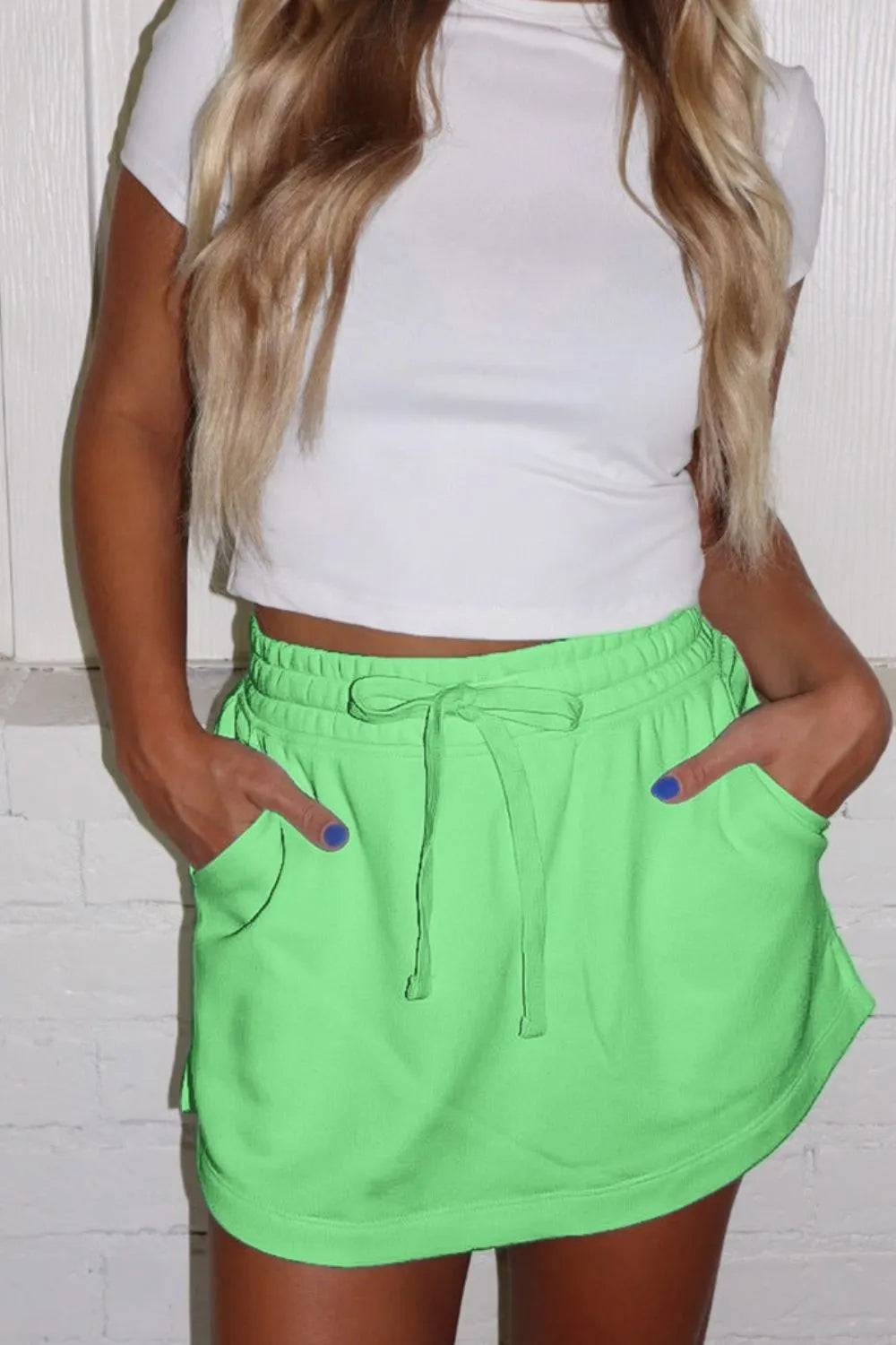 Minifalda pantalón lisa con cordón