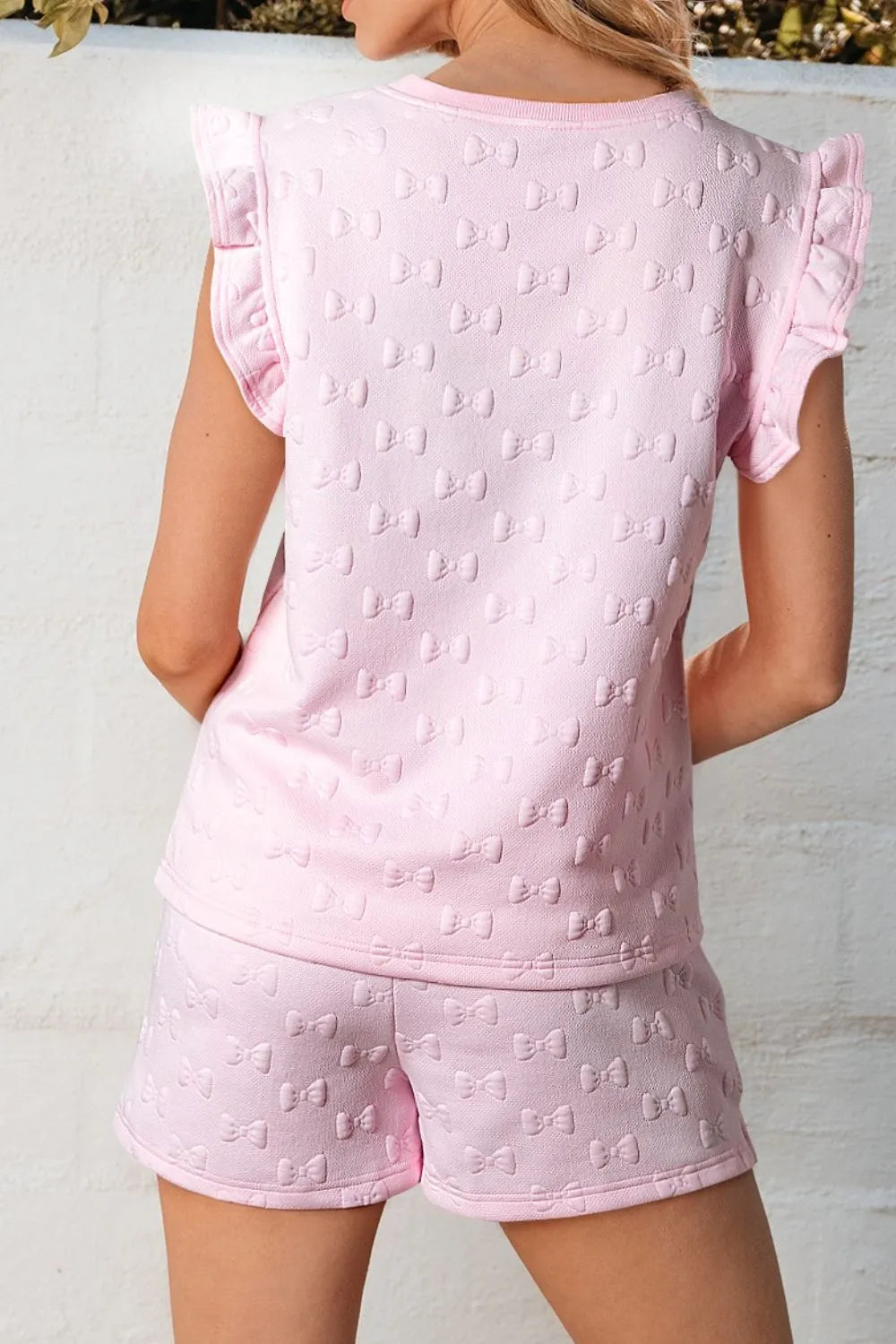 Conjunto de top y pantalones cortos con mangas cortas y volantes de jacquard con lazo