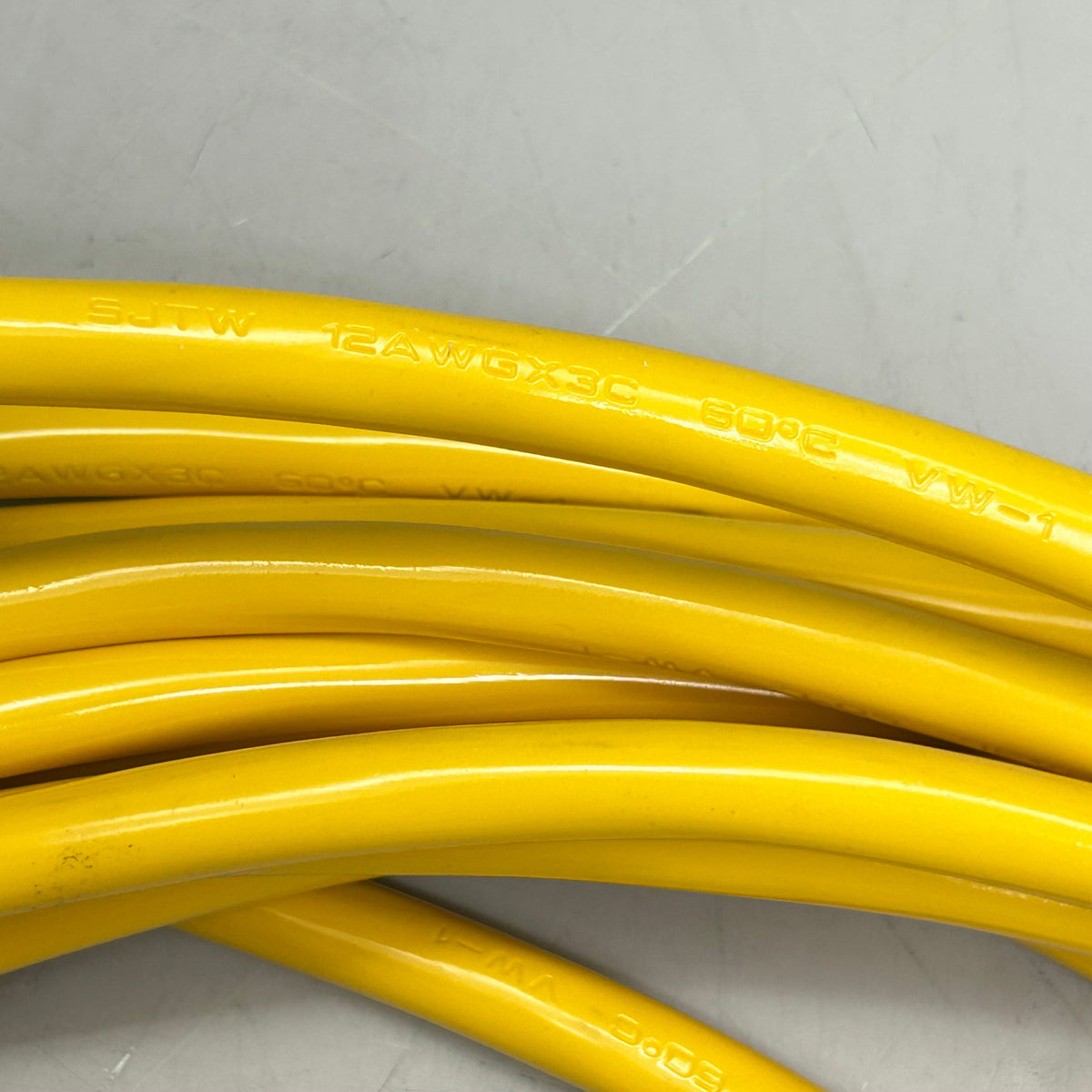 HOME ELECTRICAL ACCESSORIES  Heavy Duty Outdoor/Indoor Extension Cord  12 Gauge, 25' SJTW-3Yellow