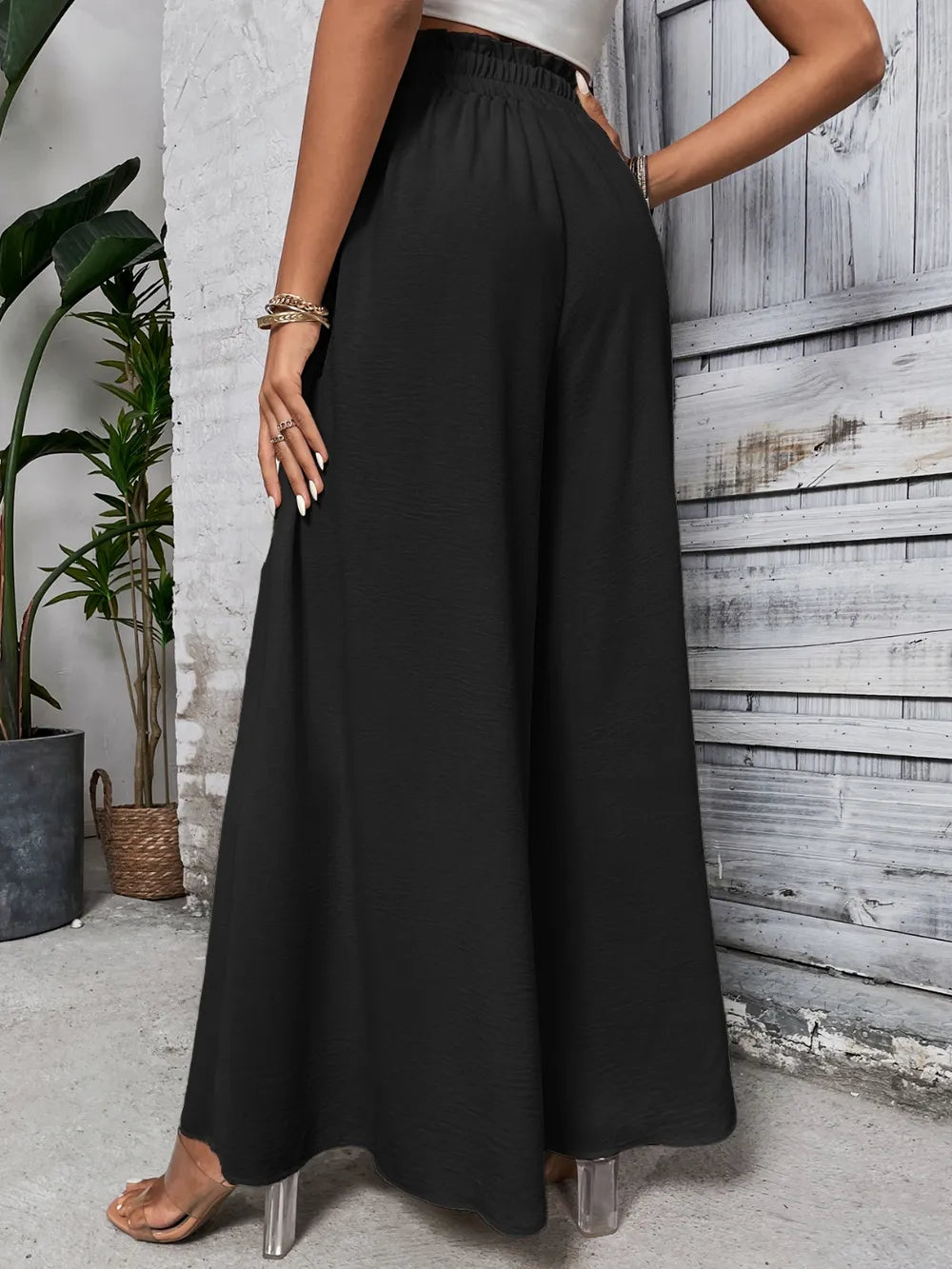Pantalones anchos de cintura alta con lazo de miel
