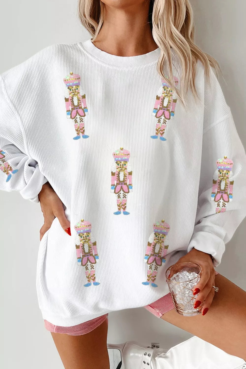 Sudadera de talla grande con hombros caídos y gráfico de Cascanueces con lentejuelas, parche de canalé grueso y cordones completos