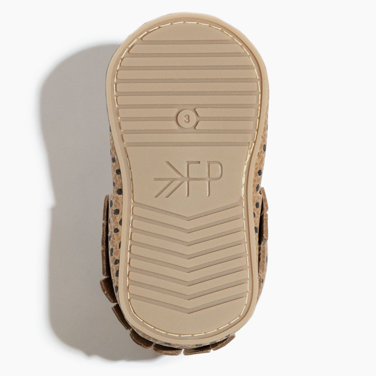 Mocasín de bebé con motas de almendra 