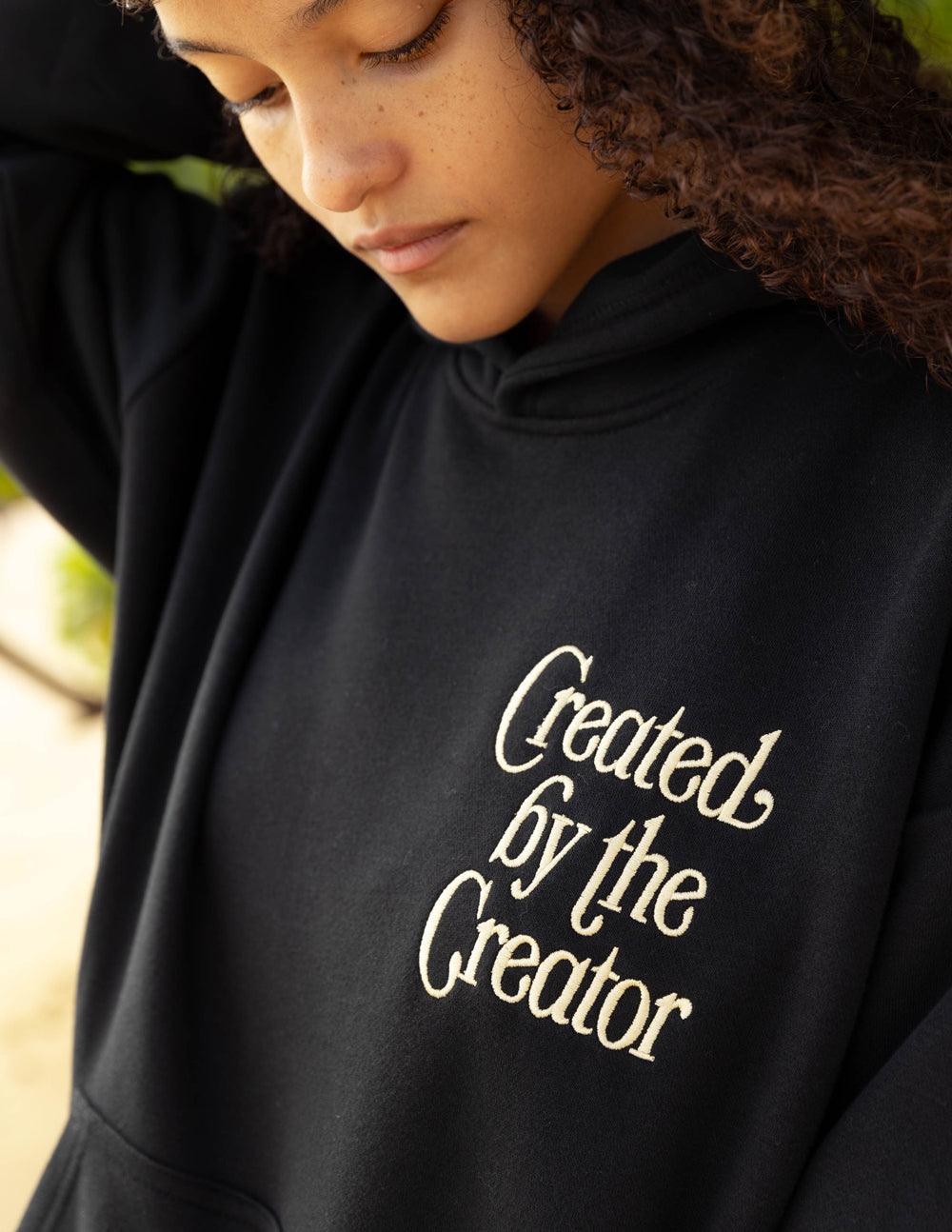 Sudadera con capucha unisex creada por el creador