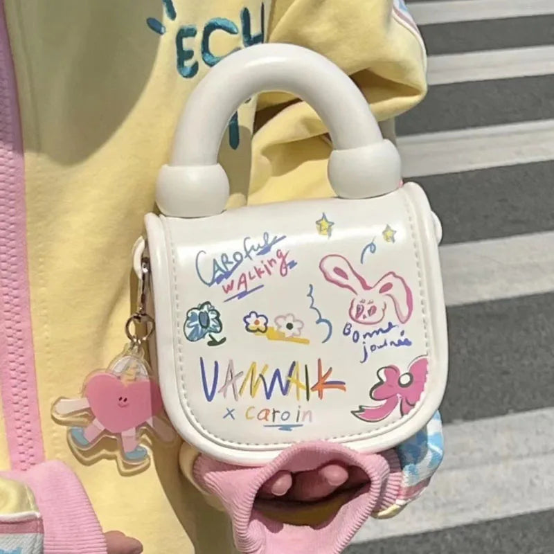 Bonita bolsa de mano con grafiti