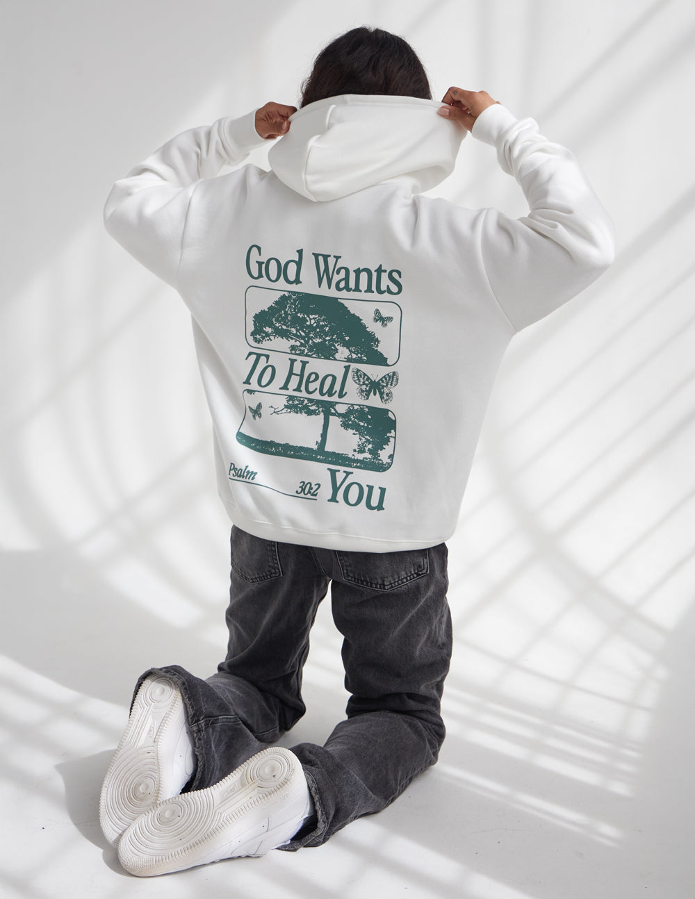 Sudadera unisex con capucha "Dios sana"