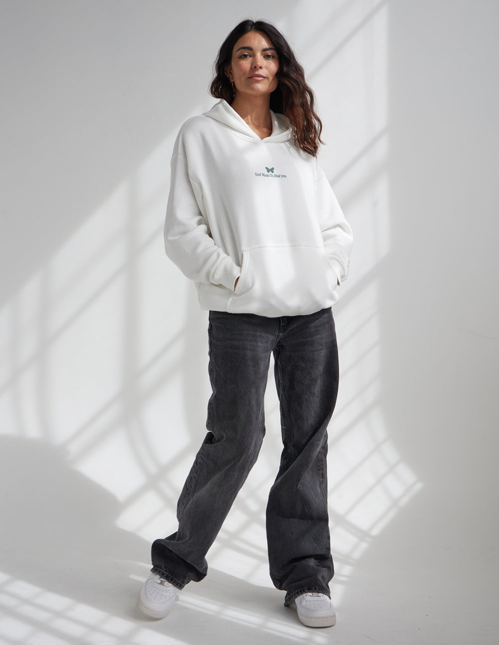 Sudadera unisex con capucha "Dios sana"