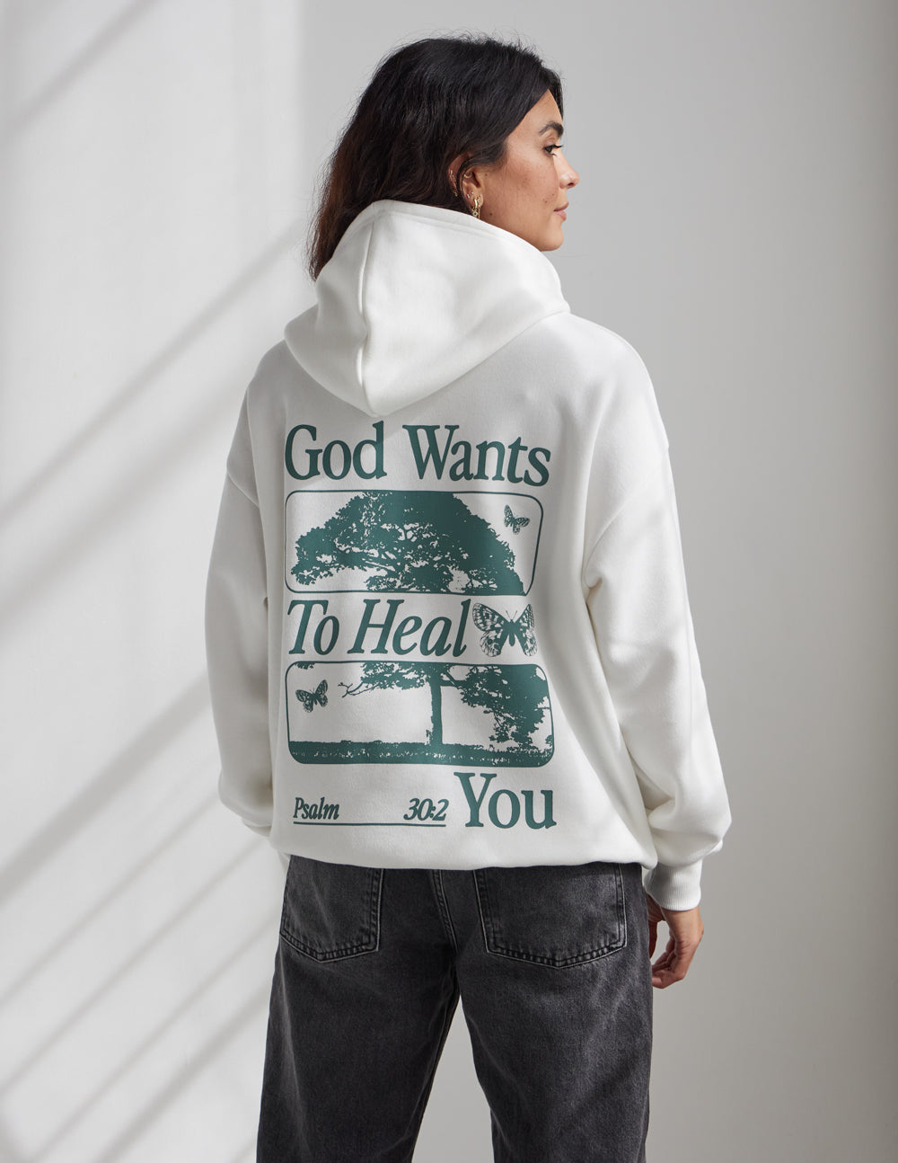 Sudadera unisex con capucha "Dios sana"