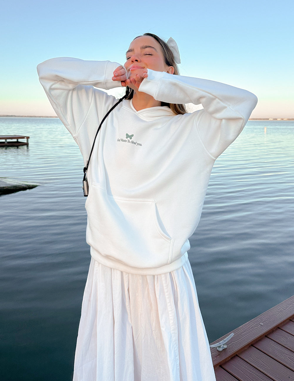 Sudadera unisex con capucha "Dios sana"
