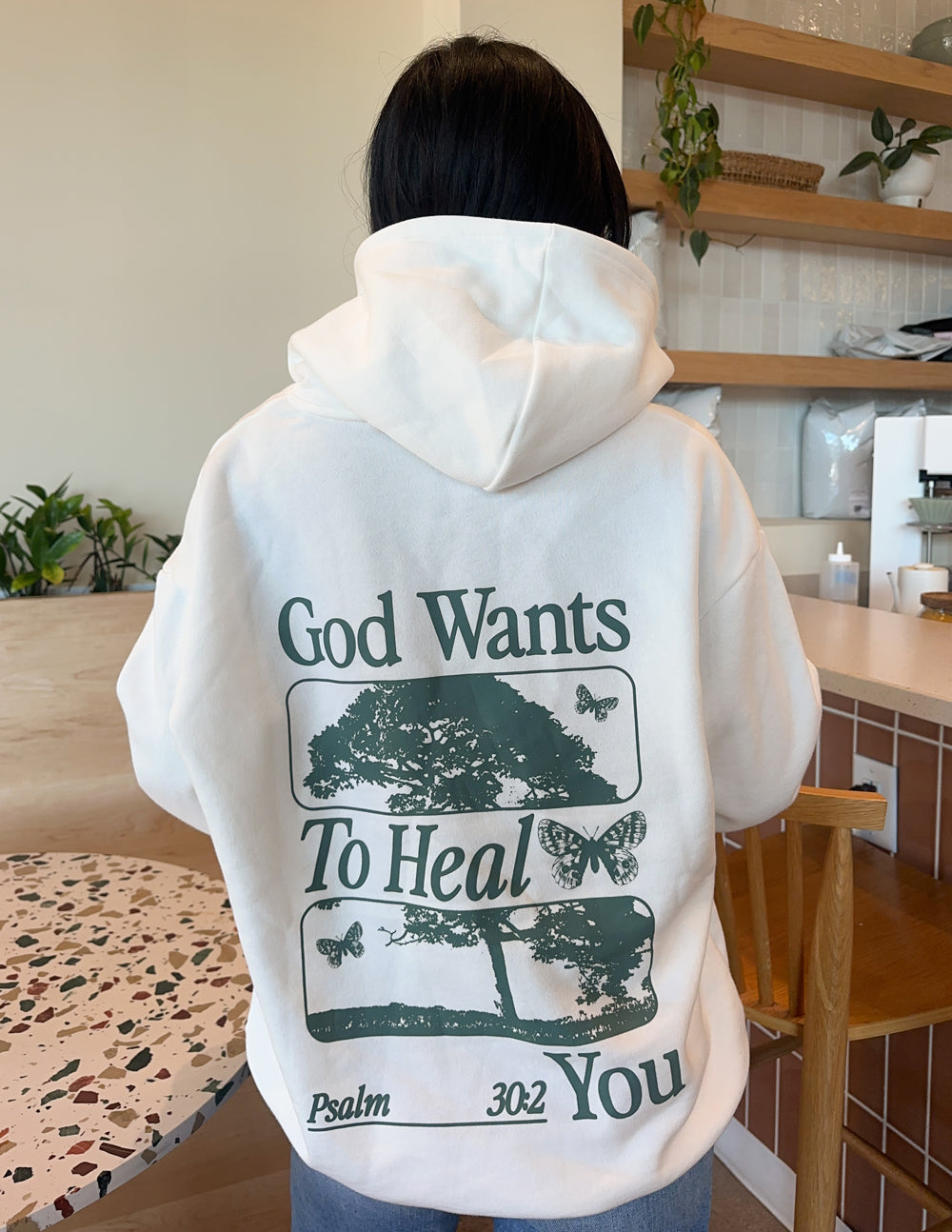 Sudadera unisex con capucha "Dios sana"