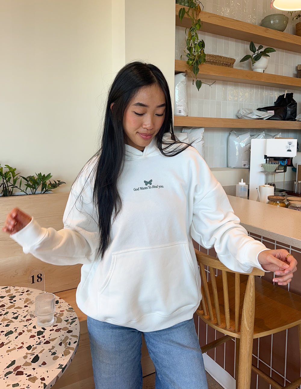Sudadera unisex con capucha "Dios sana"