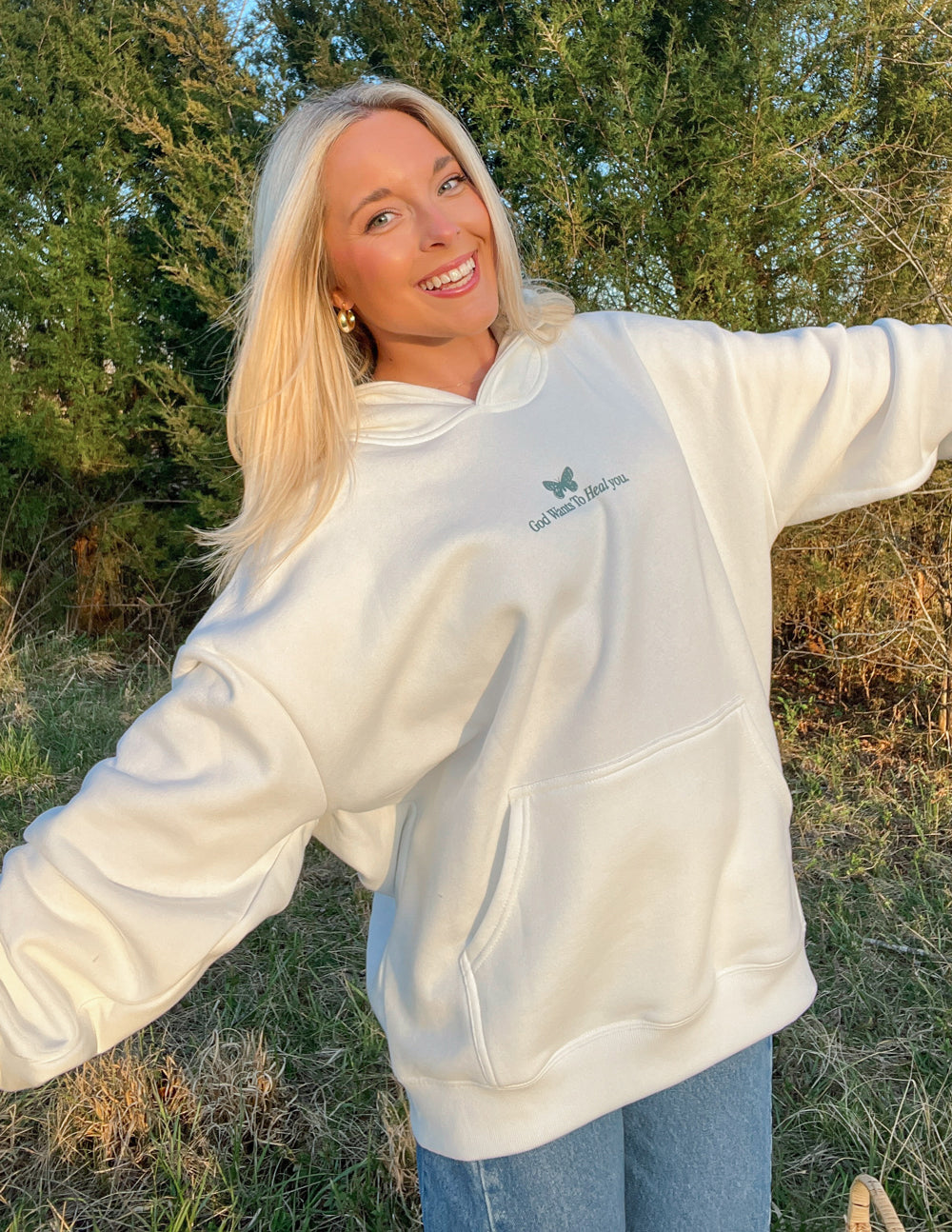 Sudadera unisex con capucha "Dios sana"