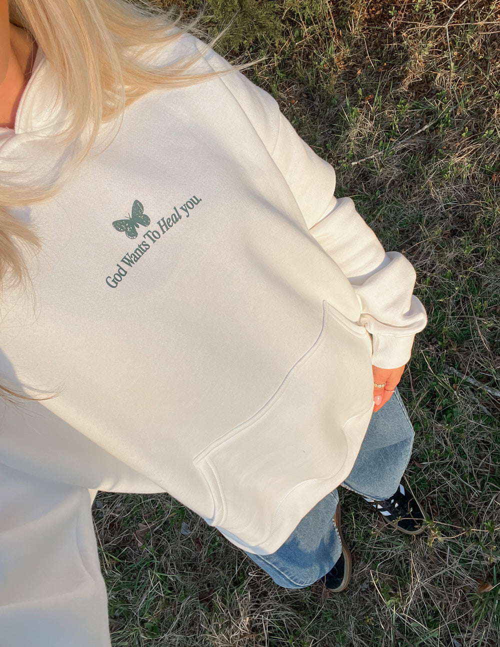 Sudadera unisex con capucha "Dios sana"