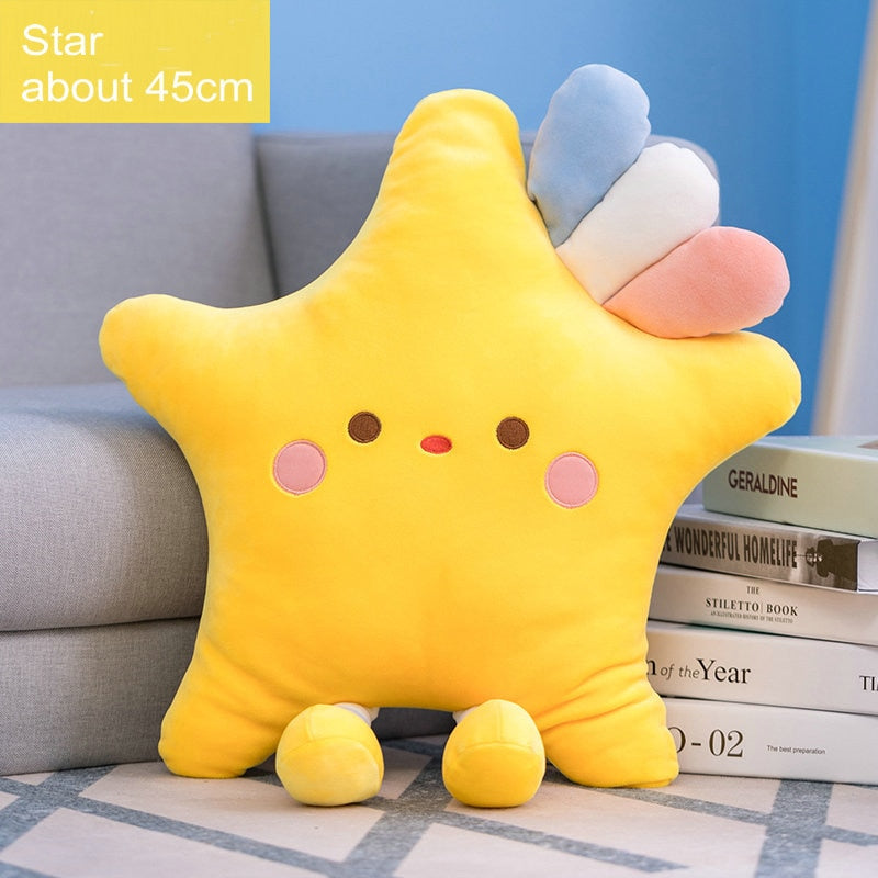 Peluches de nube arcoíris y estrellas