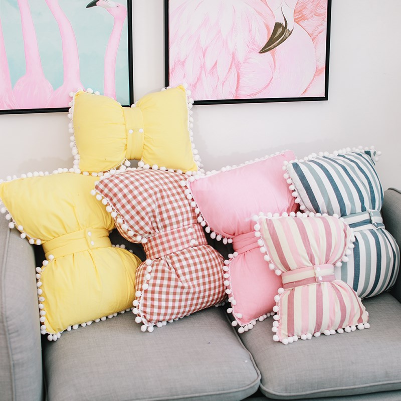 Cojines decorativos con forma de lazo