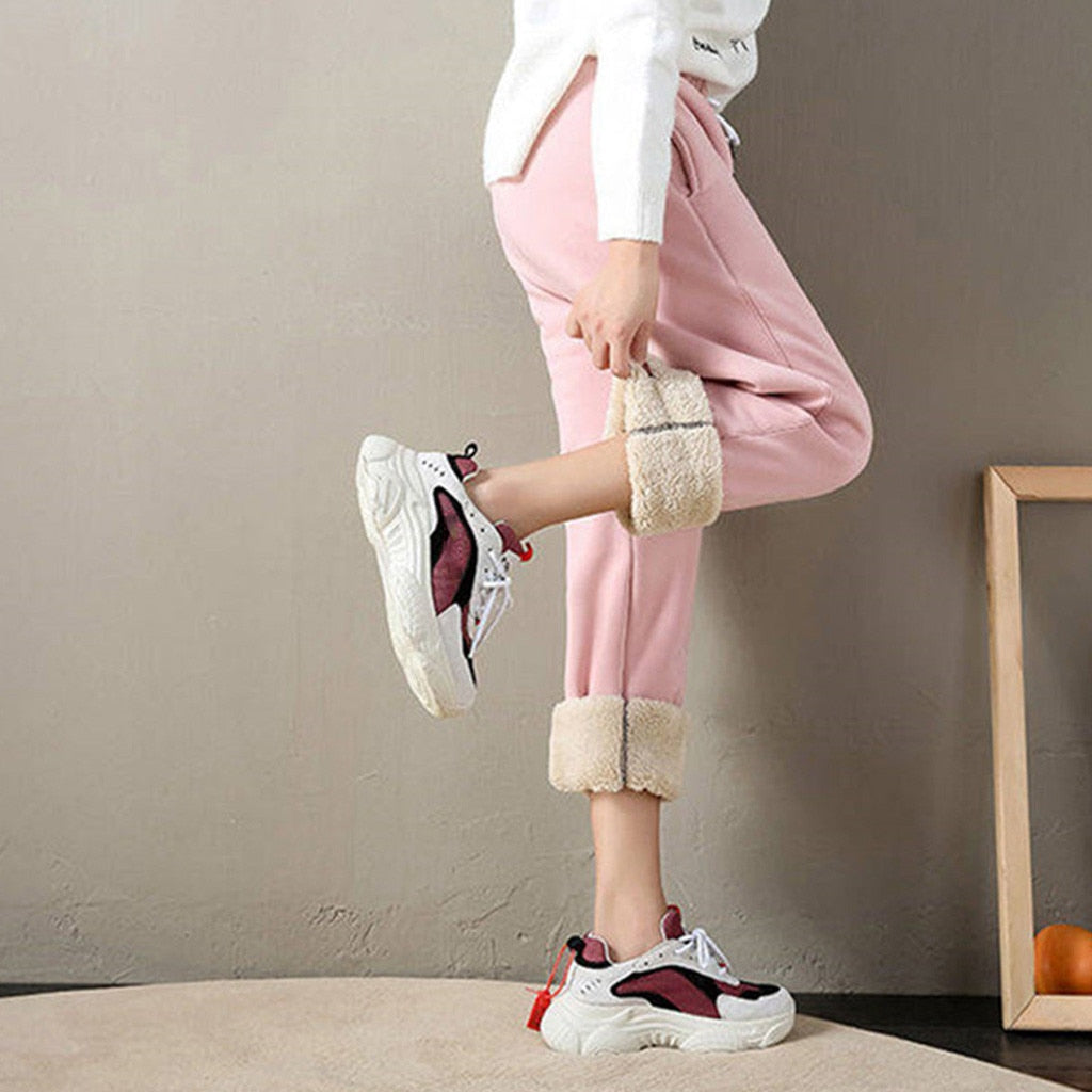 Pantalones deportivos con forro polar rosa