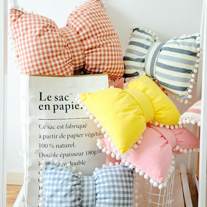 Cojines decorativos con forma de lazo