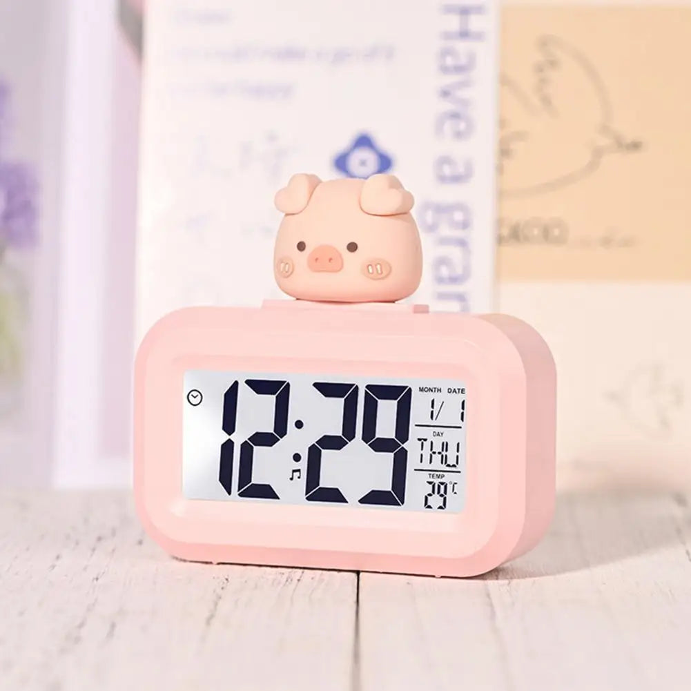 Reloj despertador digital con bonito cerdo