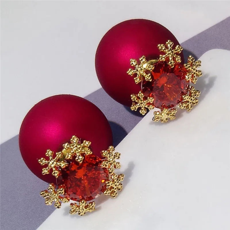 Pendientes con adornos navideños