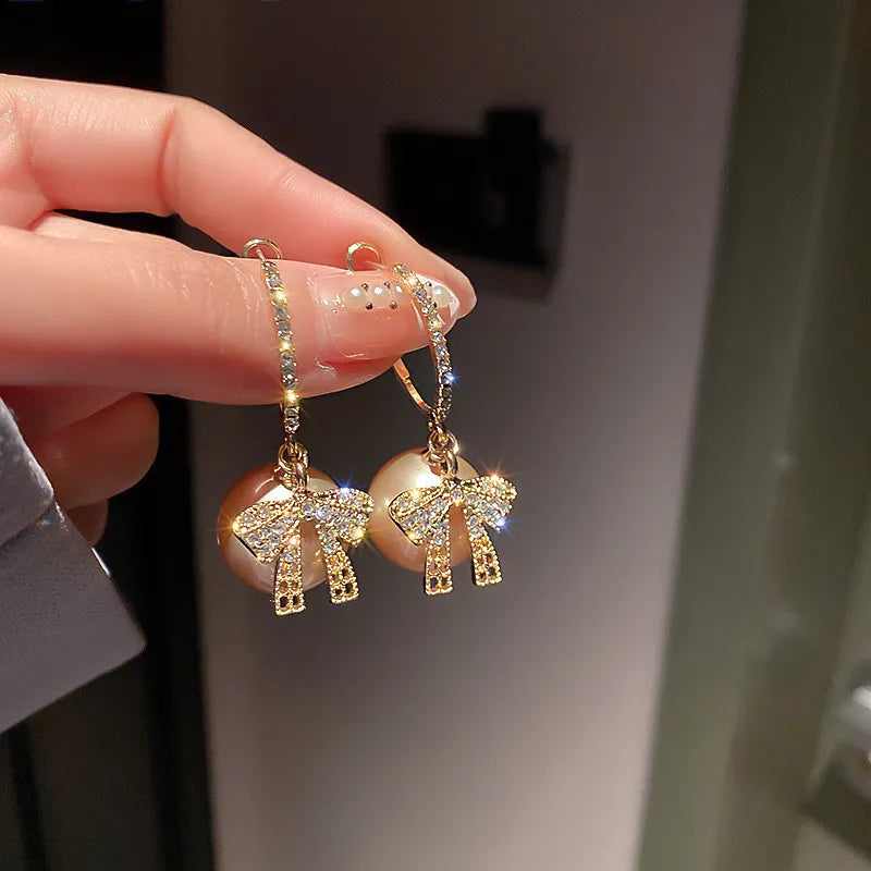 Pendientes con adornos navideños