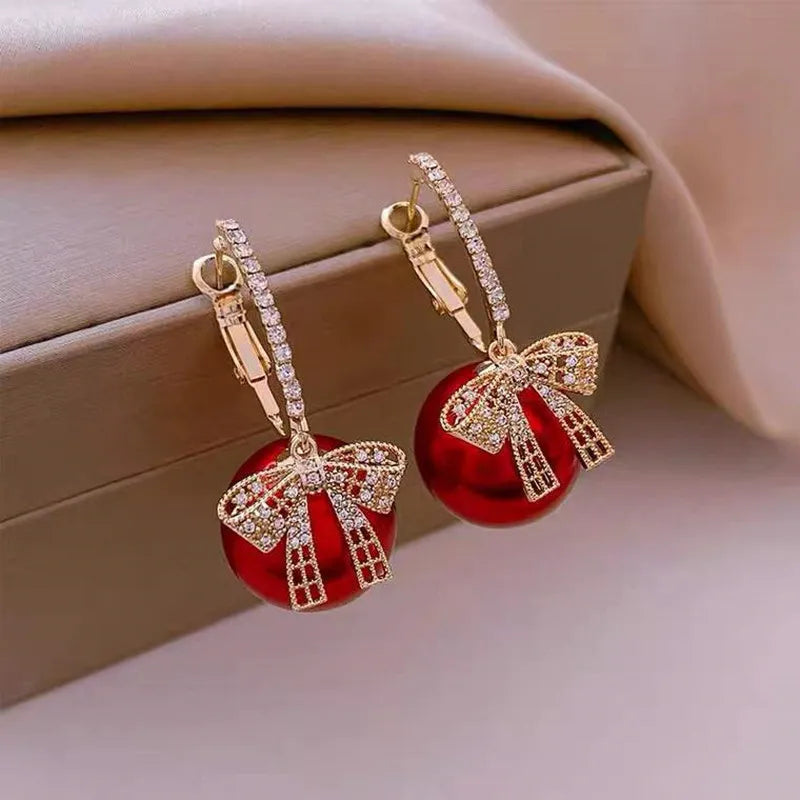 Pendientes con adornos navideños