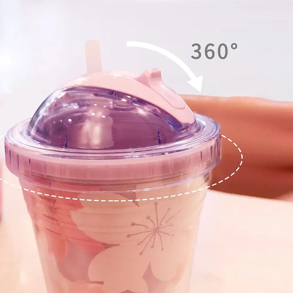 Botella de agua de plástico con diseño de flor de cerezo
