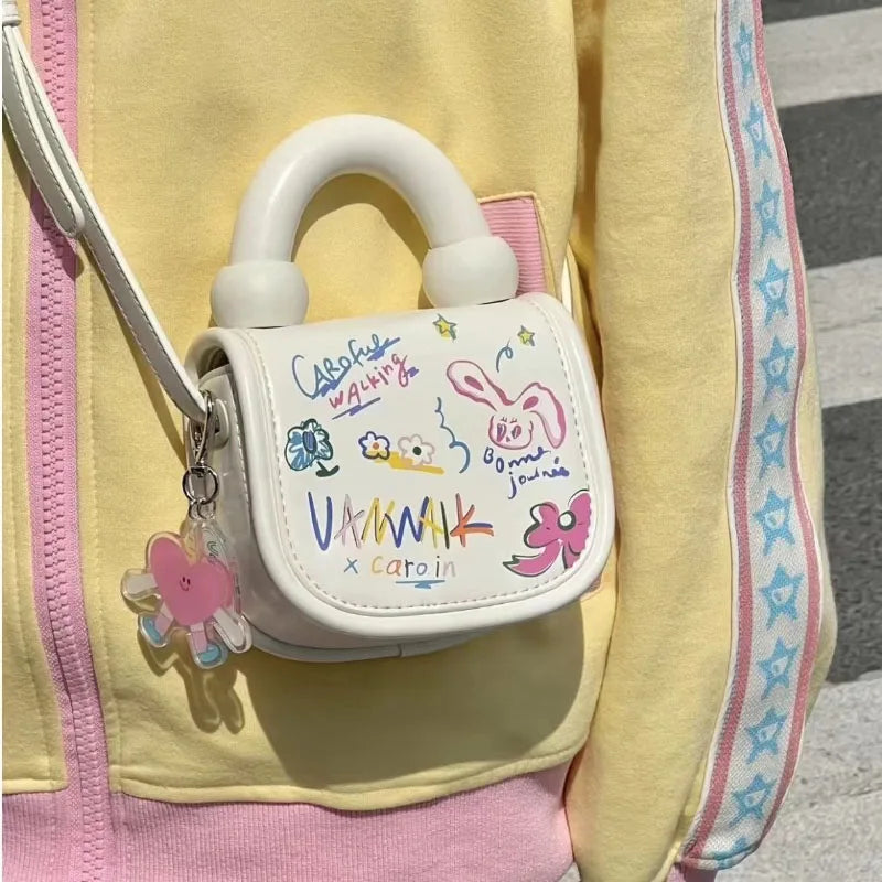 Bonita bolsa de mano con grafiti