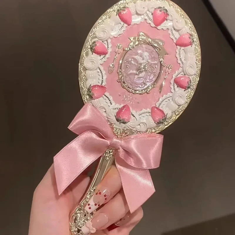 Espejo de mano de Cupido de fresa