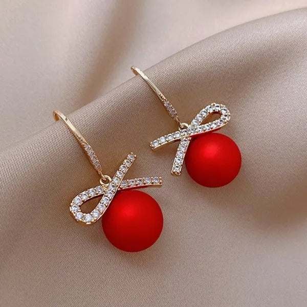Pendientes con adornos navideños